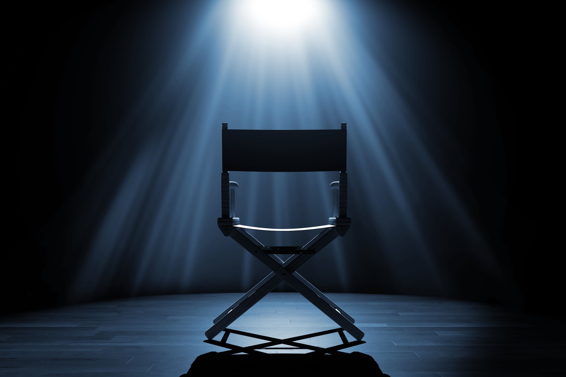 Cinema Industry Concept. Back of Director Chair in Spotlight Lights. 3d Rendering